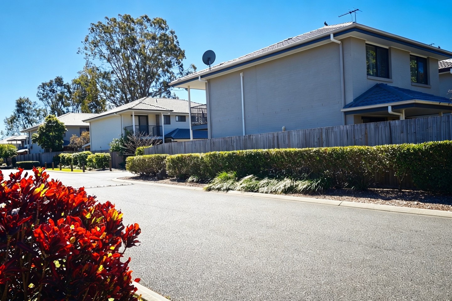 Outlook Courts townhouses bordered by neatly maintained hedges